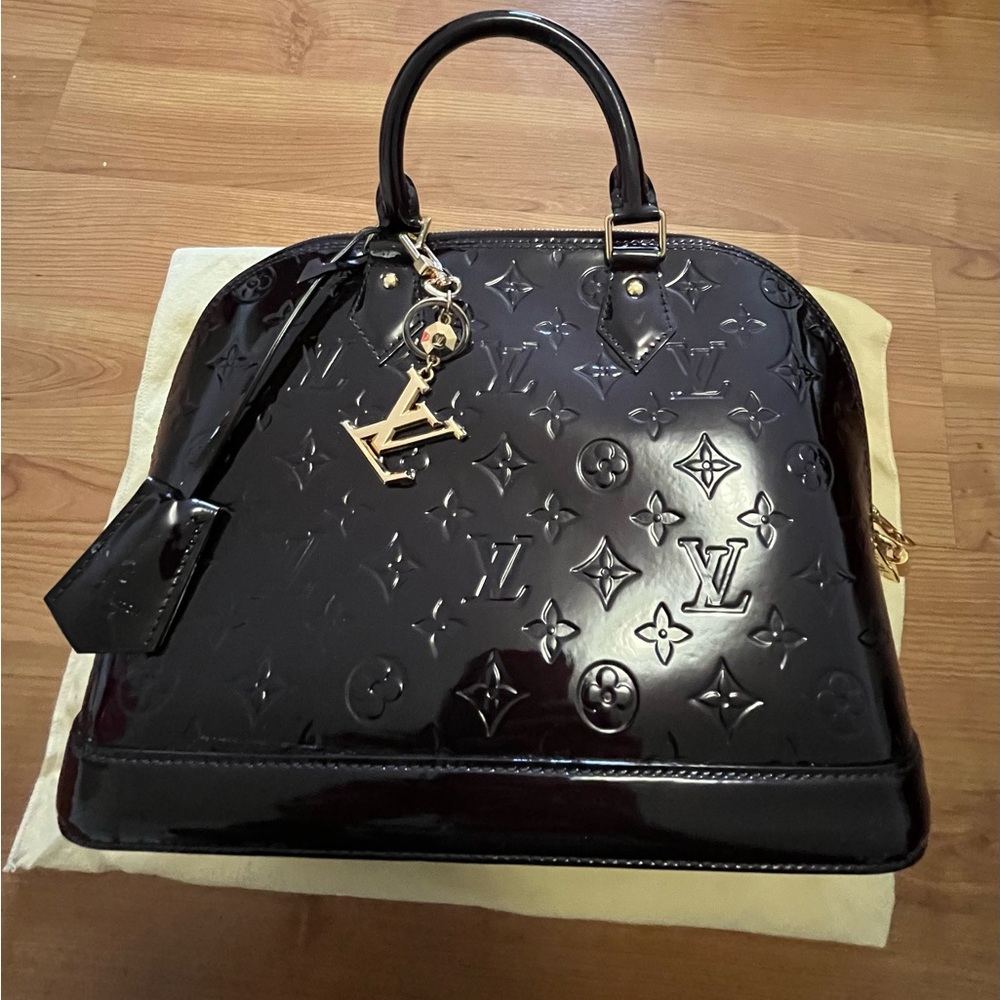 LV Burgundy Patent Leather Handbag Alba BB  Lock & LV charm with Dust Bag.